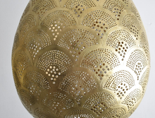Boho living room brass pendant light, unique Moroccan ceiling fixture for cozy ambiance and statement interior design.