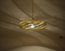Handmade brass pendant lamp for dining area, elegant Moroccan light fixture ideal for above dining tables, kitchens, or modern boho interiors.
