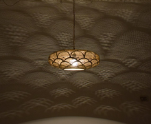 Handmade Moroccan brass light fixture, elegant pendant lamp perfect for dining tables, kitchens, or living room ceiling lighting.