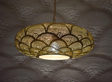Authentic Moroccan brass ceiling lamp with intricate piercings, designed for dining rooms and modern interiors.