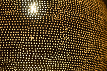Brass dome Moroccan chandelier pendant lamp, designed for ceiling installation, giving a soft golden glow to home interiors.