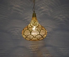 Brass Moroccan porch ceiling lamp with intricate cutout detailing, suspended by chain for use as a hanging lantern in covered patios or verandas.