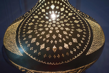 Brass Moroccan hanging pendant lamp with polished finish, versatile as a boho living room light or eclectic ceiling centerpiece.