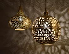 Moroccan hanging brass lights clustered for kitchen illumination