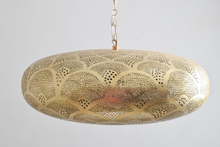 Handmade Moroccan brass pendant cluster for dining area