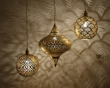 Handmade Moroccan foyer lighting with brass hanging lamps