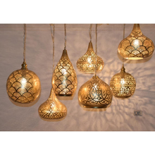 Cluster of 7 Moroccan brass pendant ceiling lamps for stairwell