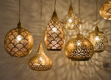Handcrafted ceiling fixture with 7 hanging lamps