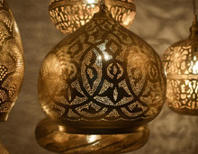 Moroccan 9-light brass ceiling fixture for dining room