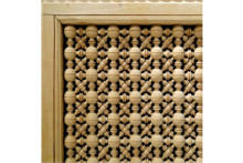 Fine turned spindle lattice panel — solid wood grain and finish detail