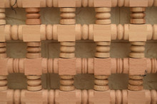Framed turned spindle lattice panel in hand-cut solid wood