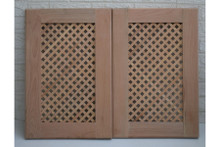 Diagonal diamond lattice panel — solid wood grain and finish detail