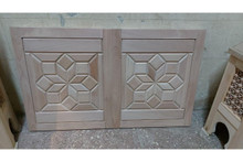 Star marquetry wood door — solid wood grain and finish detail