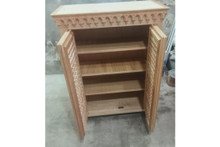 Custom carved arched cabinet — hand-carved Egyptian mashrabiya woodwork