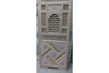 Arched niche cabinet in hand-cut solid wood