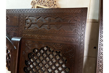 Custom mashrabiya bed frame and headboard — hand-carved Egyptian mashrabiya woodwork