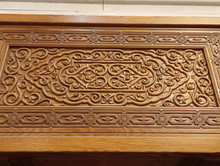 Mashrabiya double door — hand-carved eight-point star pattern