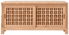 Mashrabiya record console in raw beech — straight-on front view of the sliding turned-spindle doors