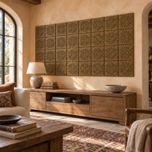 Diamond Lattice Knot in hand-embossed brass, as a large wall panel above a low media console in a living room