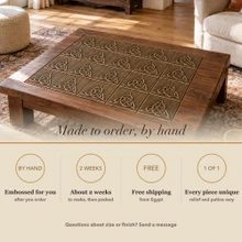 Card noting that the Interlaced Trinity Knot tiles are made to order by hand