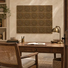 Sun Star Knot Celtic knot tiles in hand-embossed brass, as a wall panel above a wooden writing desk in a study
