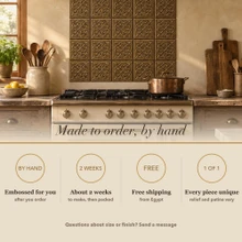 Card noting that the Lattice Loop Knot tiles are made to order by hand
