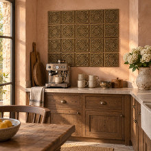 Fine Ring Knot Celtic knot tiles in hand-embossed brass, as a backsplash panel above a coffee station counter in a kitchen