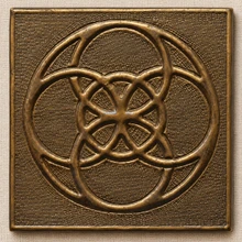 Circle Flower Knot Celtic knot tiles, solid brass hand-embossed in aged bronze: front view of one 10 cm (4 in) tile