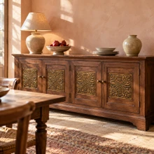 Thistle hand-embossed solid brass tiles in aged bronze inset in the doors of a walnut sideboard
