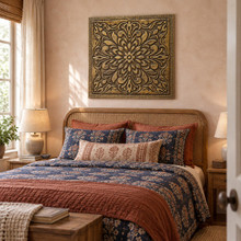 Mandala, hand-embossed solid brass panel in aged bronze: hung above a bed
