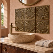 Petal Rosette, hand-embossed solid brass in aged bronze: bathroom vanity backsplash