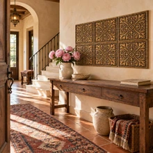 Swirling Acanthus, hand-embossed solid brass in aged bronze: entrance hall feature wall above a console