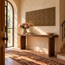 Starburst, hand-embossed solid brass in aged bronze: entrance hall feature wall above a console