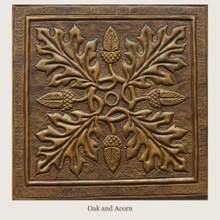 Oak and Acorn: one hand-embossed solid brass tile in aged bronze, 6 mm deep with a raised rim, shown as it will be made