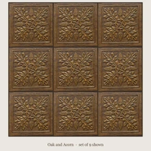 Oak and Acorn: a set of 9 hand-embossed brass tiles laid in a straight grid, aged bronze