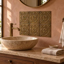 Cartouche, hand-embossed solid brass in aged bronze: bathroom vanity backsplash