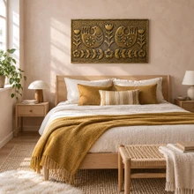 Folk Birds, hand-embossed solid brass panel in aged bronze: hung above a bed