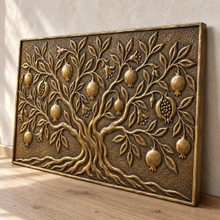 Pomegranate Tree, one hand-embossed brass wall panel: three-quarter view showing the 10 mm edge and plain raised rim