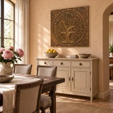 Swirling Tree of Life in a circle, one hand-embossed brass wall panel in aged bronze: hung above a sideboard in a dining room