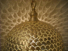 Handmade Brass Pendant Lamp in Moroccan Design – Unique boho ceiling light adding exotic charm and ambient lighting to modern or traditional interiors.