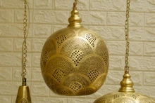 Moroccan cluster lights over kitchen island