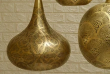 Moroccan lights over kitchen island