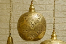 Moroccan cluster lights over kitchen island