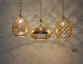 Handcrafted brass cluster lamp in dining room