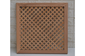 Diagonal diamond lattice panel in hand-cut solid wood