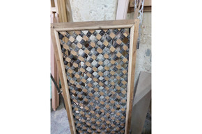 Diamond lattice room divider in hand-cut solid wood