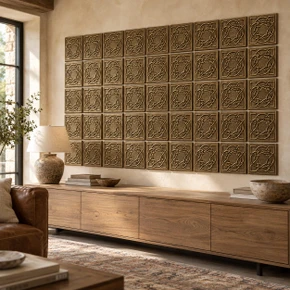 Fine Ring Knot Celtic knot tiles in hand-embossed brass, as a large wall panel above a low media console in a living room