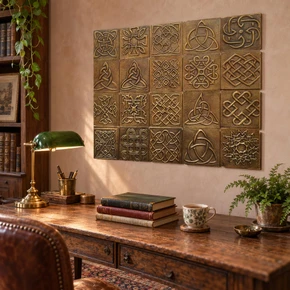 Twenty hand-embossed brass Celtic knot tiles hung as an art grid above an oak writing desk in a study