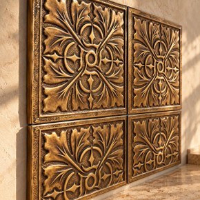 Swirling Acanthus, hand-embossed solid brass in aged bronze: close-up of the 6 mm tile edges and raised rims