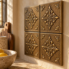 Fleur Cross, hand-embossed solid brass tiles in aged bronze: close-up of the 6 mm tile edges and raised rims